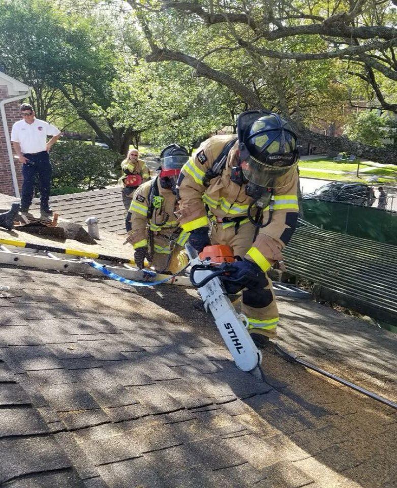 Firefighters Training On Roof