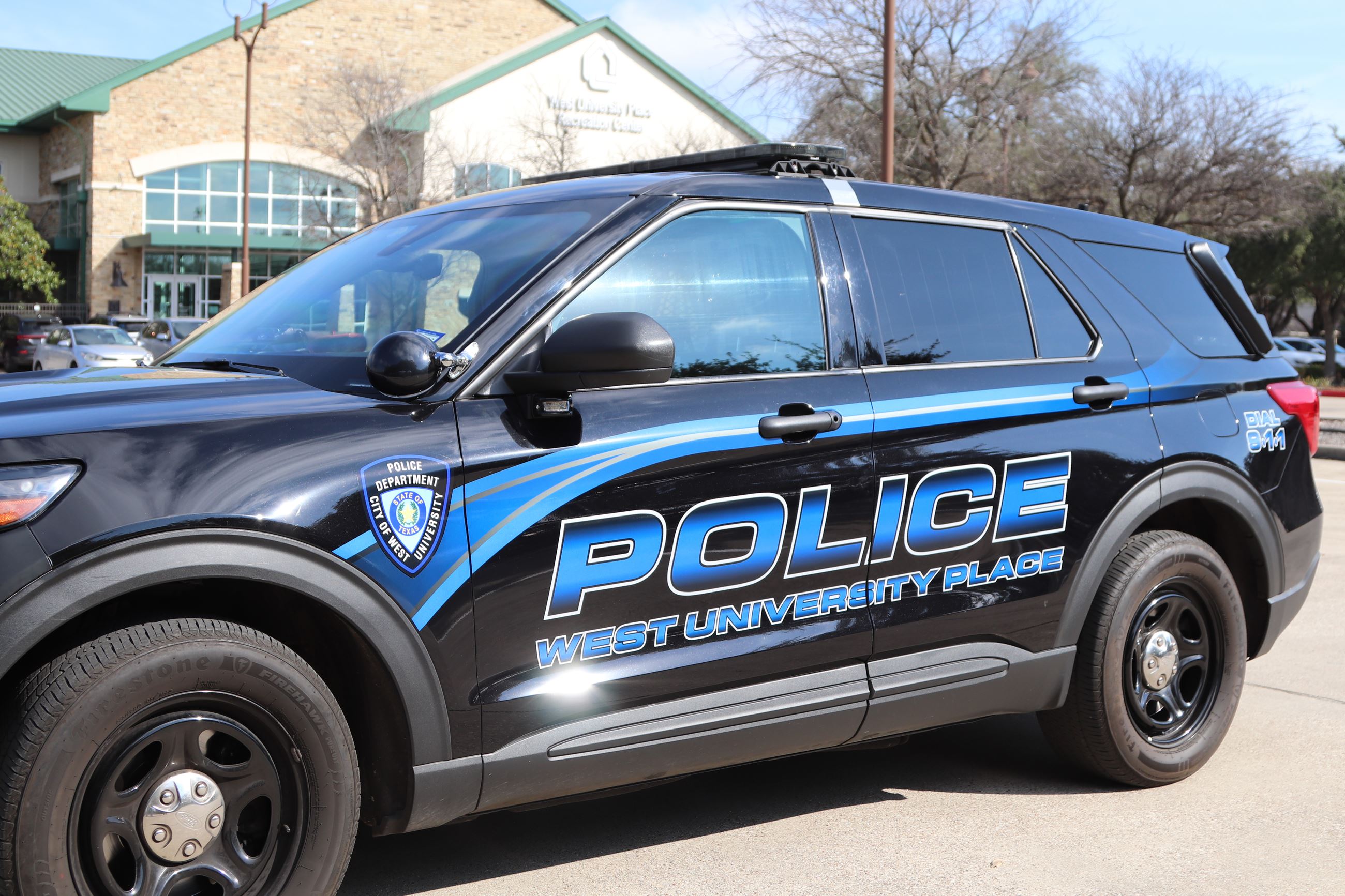 New Black West U PD Patrol Cars with vibrant blue letters that read \